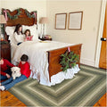 Homespice Pinecone Braided Area Rugs 6x9' – Rustic Jute Braided Green Rug for Bedroom, Living Room and Dining Area