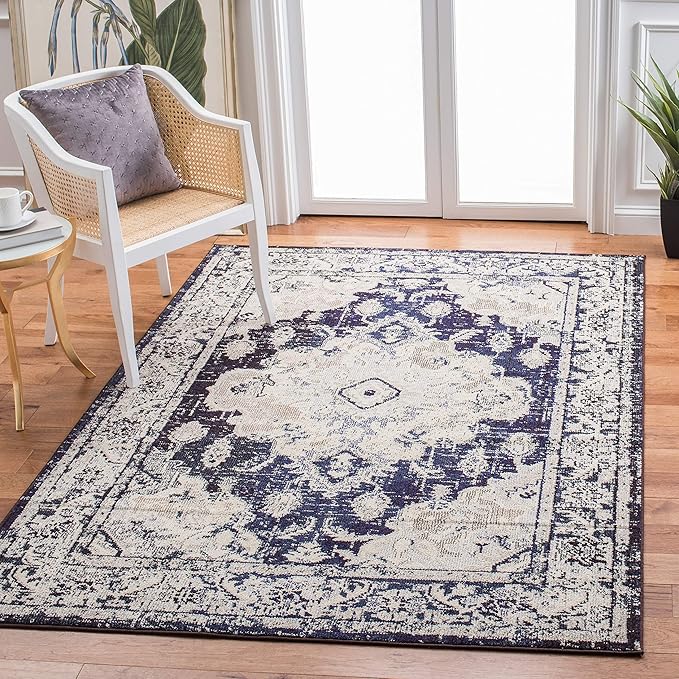 SAFAVIEH Monaco Collection Area Rug - 5'1" x 7'7", Ivory & Navy, Boho Chic Medallion Distressed Design, Non-Shedding & Easy Care, Ideal for High Traffic Areas in Living Room, Bedroom (MNC243C)