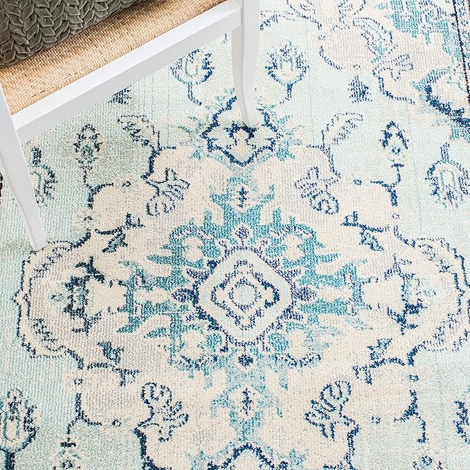 SAFAVIEH Monaco Collection Area Rug - 5'1" x 7'7", Light Blue & Ivory, Boho Chic Medallion Distressed Design, Non-Shedding & Easy Care, Ideal for High Traffic Areas in Living Room, Bedroom (MNC243K)