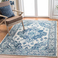 SAFAVIEH Monaco Collection Area Rug - 8' x 10', Ivory & Blue, Boho Chic Medallion Distressed Design, Non-Shedding & Easy Care, Ideal for High Traffic Areas in Living Room, Bedroom (MNC243A)