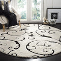 SAFAVIEH Florida Shag Collection Area Rug - 6'7" Round, Ivory & Black, Scroll Design, Non-Shedding & Easy Care, 1.2-inch Thick Ideal for High Traffic Areas in Living Room, Bedroom (SG455-1290)